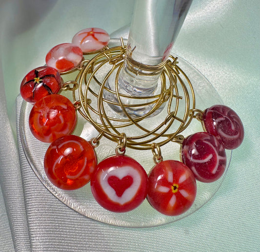 Red glass charms with gold metal rings - Powerglassworks